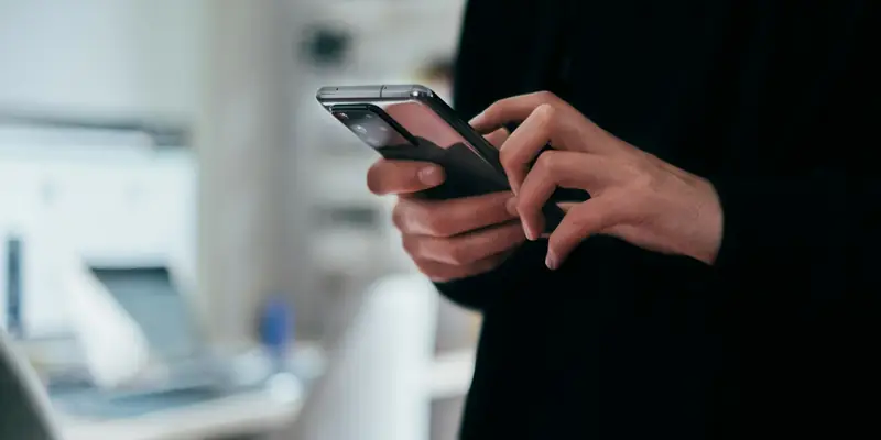 Customer chatting with a business on a smartphone