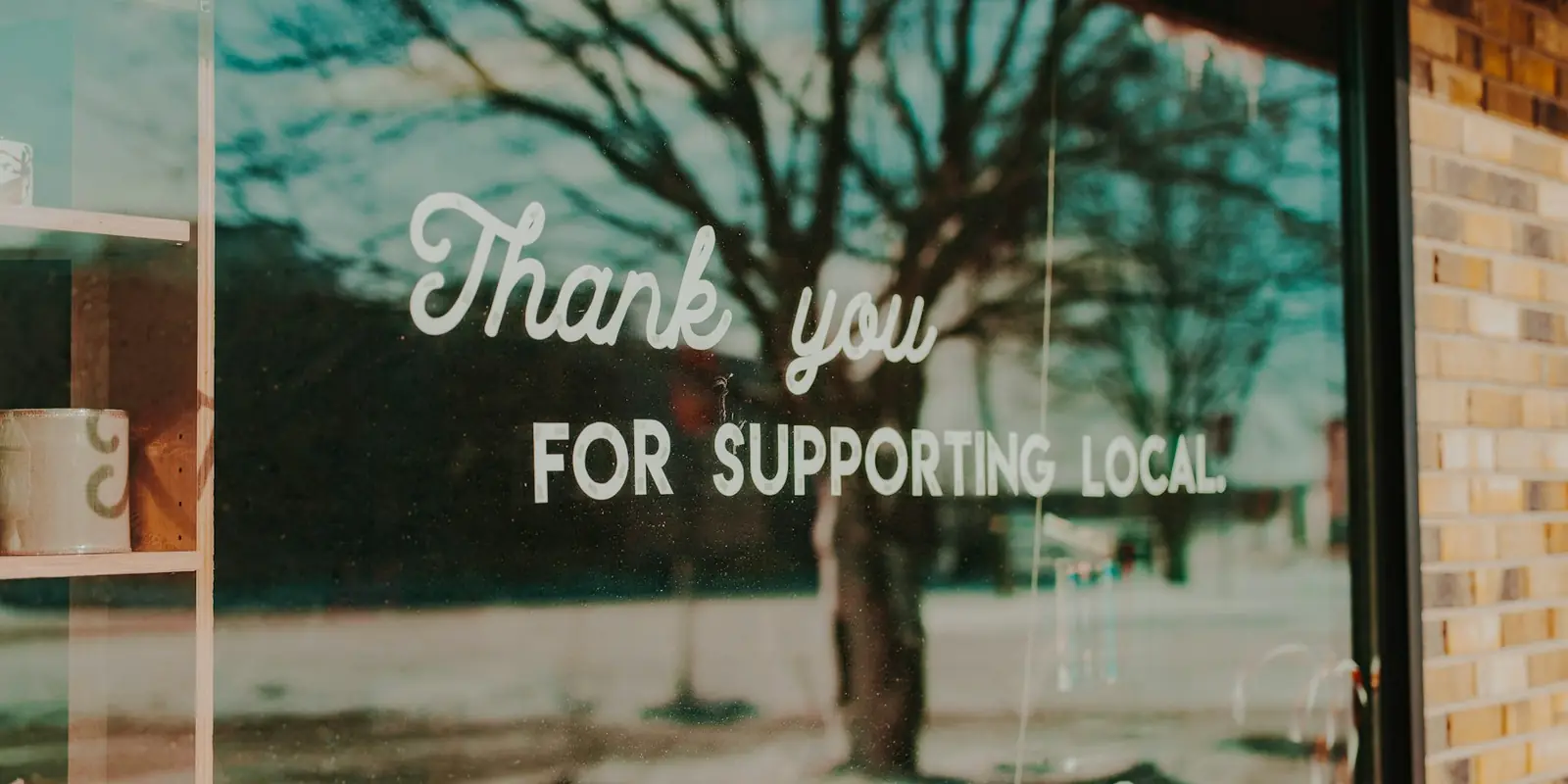 Support local sign in a small business window (Local SEO)