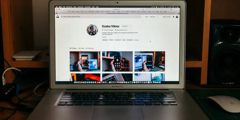Laptop showing a website on a desk