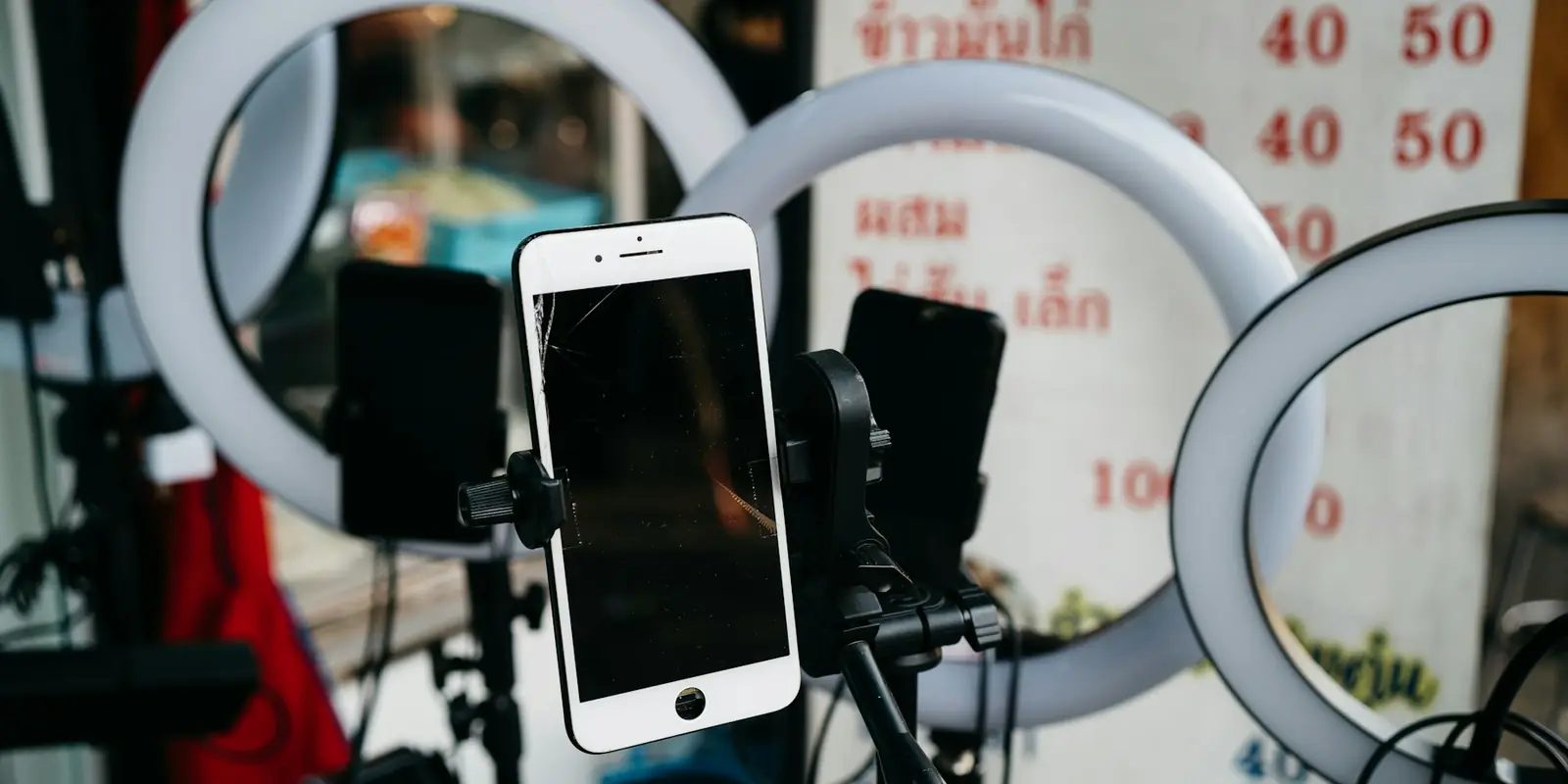 Smartphone on a tripod set up for live selling