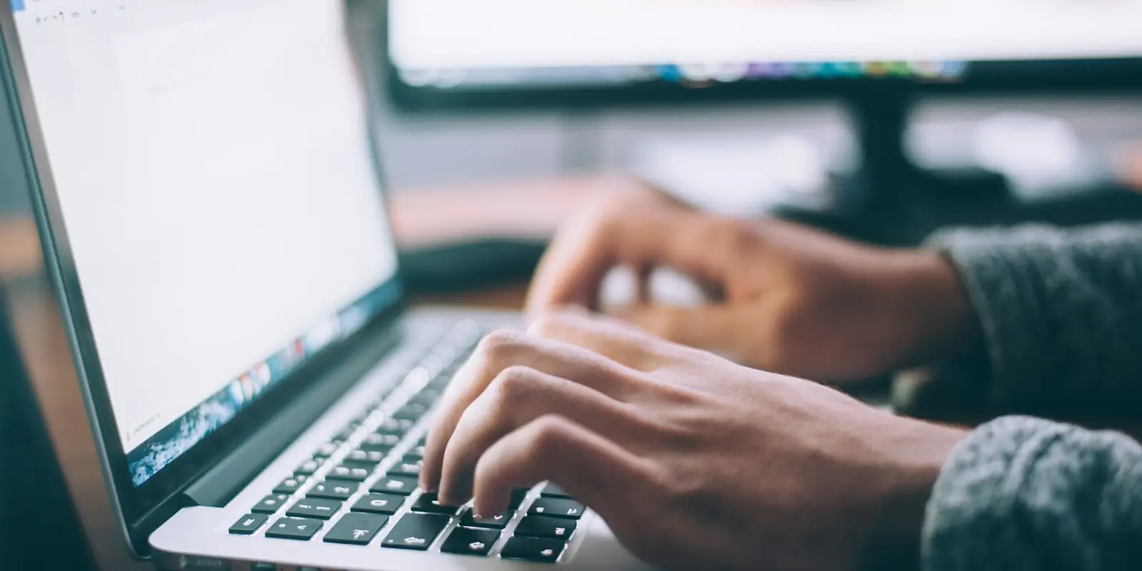 Developer building a website on a laptop